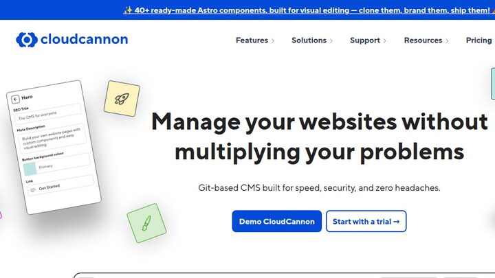 CloudCannon homepage — blue cloudcannon logo top left, headline 'Manage your websites without multiplying your problems', subhead 'Git-based CMS built for speed, security, and zero headaches', Demo CloudCannon and Start with a trial buttons, decorative phone-shaped UI mockup on the left