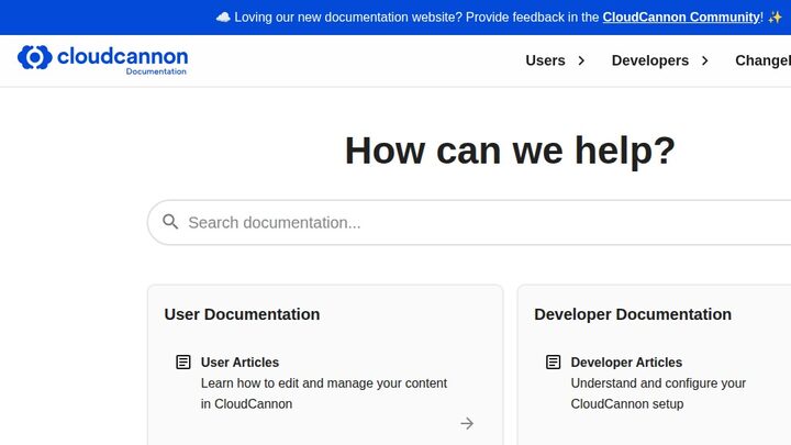 CloudCannon documentation home — 'How can we help?' heading, central search box 'Search documentation...', User Documentation card on the left, Developer Documentation card on the right, banner reads 'Loving our new documentation website?'